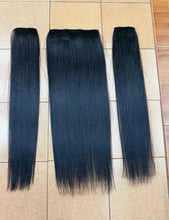 Load image into Gallery viewer, Human hair extension, 60 centimeters long (reaches below the waist when attached). Weight approximately 210 grams.