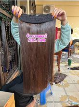 Load image into Gallery viewer, Human hair extension, 60 centimeters long (reaches below the waist when attached). Weight approximately 210 grams.